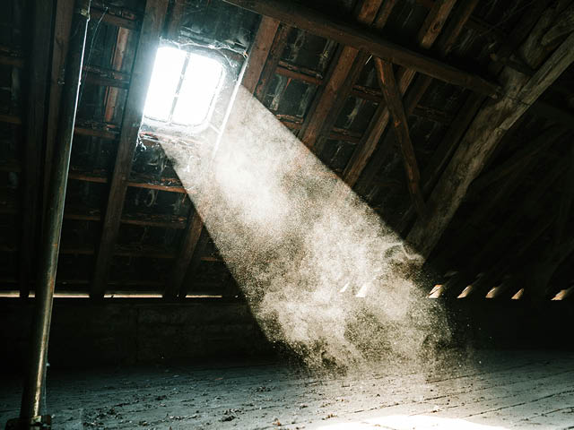 A ray of sun in a dusty attic