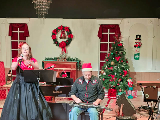Gina Mazzoli and Tim Nekritz perform on-stage