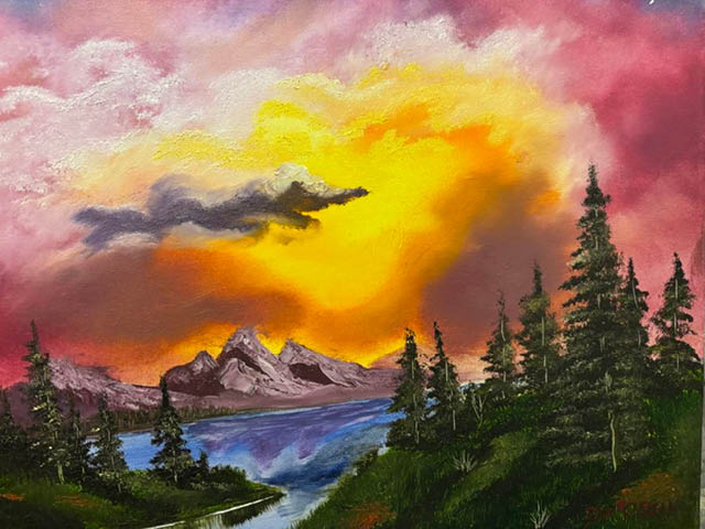 Painting of a mountain scene at sunset