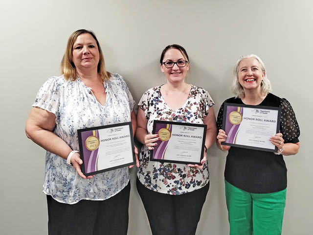 Pictured from left with their awards are Dunsmoor, Allison and Hinman. 