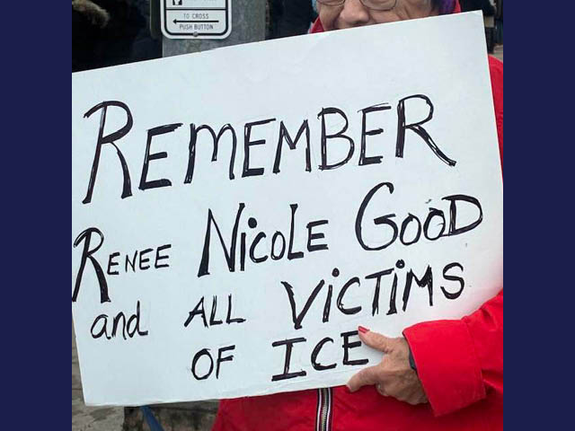 A photograph of a sign being held by a protestor that says "Remember Renee Nichole Good and all victims of ICE"