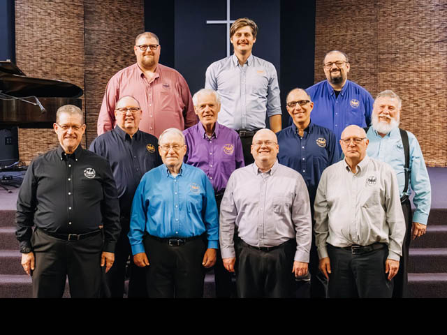 A group photo of the Oswego Valley Snowbelters, a singing group of all older men