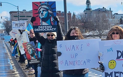 line the bridge protest indivisible oswego county 3.22.2025
