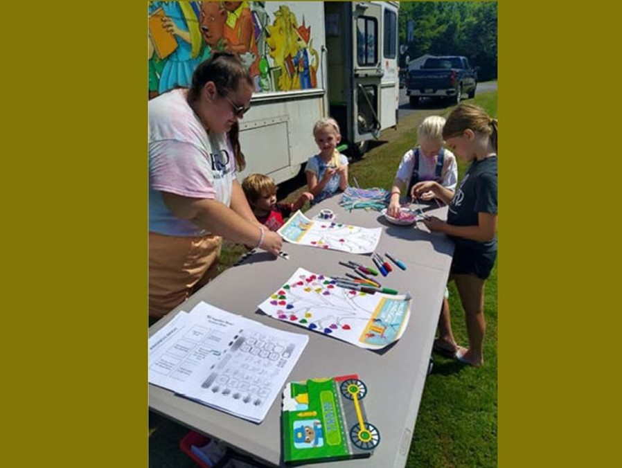Oswego Classroom Teachers Association Donates to Oswego Bookmobile