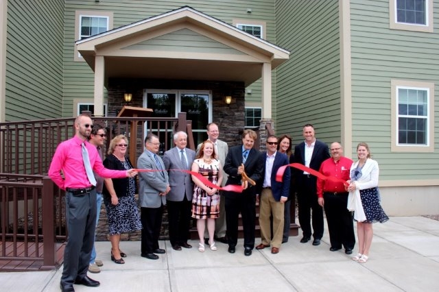 Premier Living Suites celebrates grand opening with ribbon cutting