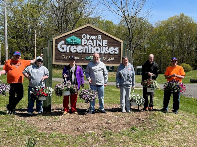 Oswego Industries Partners with Oliver Paine Greenhouses for Annual Hanging Basket Fundraiser