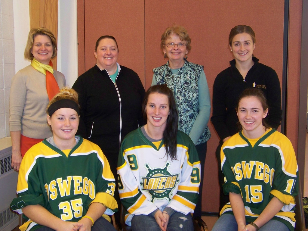 SUNY Oswego Laker ice hockey teams  collecting toy and food donations
