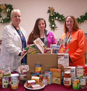 Catholic Charities Receives Support from St. Luke Health Services Employees this Holiday Season