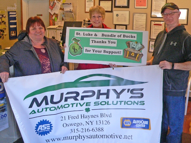 Murphy’s Automotive Solutions in Oswego Shows Their Support for St. Luke’s “Bundle of Bucks” Charity Raffle on May 5