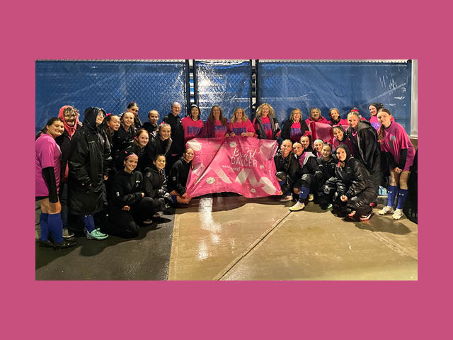 Oswego Varsity Girls Soccer Team Donates to Fight Breast Cancer