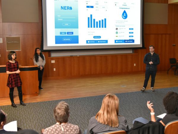Making a pitch -- SUNY Oswego human-computer interaction master&#039;s students (from left) Bharati Mahajan, Khushboo Panchal and Joseph Gray discuss their concept for Nero, a water tracking and conservation app, at the recent Grand Challenges Makeathon on campus, which challenged students for solutions related to the college-wide Fresh Water for All initiative. The competition and the student team are part of the rise in entrepreneurial activities and opportunities for SUNY Oswego students.