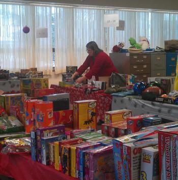 Deanne Myers of Oswego County Department of Social Services (DSS) prepares toys for distribution during last year’s DSS Children’s Fund. To expand this year’s Children’s Fund, DSS forged a partnership with United Way of Greater Oswego and welcomed Catholic Charities of Oswego County and other agencies to join them in this partnership. For more information on the Children’s Fund or to request a pick-up for donations, contact Helen Hoefer at Catholic Charities at 315-598-3980 or Carol Lee at DSS at 315-963-5246.      