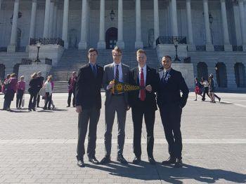 Representing students -- SUNY Oswego students (from left) Peter Mancarella, Derek Smith, Alex George and Eusebio Omar Van Reenen pause in front of the U.S. Capitol last month as they represent Oswego and all SUNY students in Washington, D.C., to advocate for issues that push student success forward. 