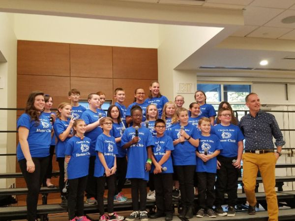 The Charles E. Riley Elementary School Honor Choir became the first elementary school group to be invited to perform at the LeMoyne College Vocal Jazz Festival in the prestigious event’s 14 year history. The audition ensemble, pictured with advisor Ceara Windhausen at left and internationally renowned vocalist and educator Greg Jasperse at right, received a standing ovation for their performance of Duke Ellington’s “It Don’t Mean A Thing (If It Ain’t Got that Swing)” and Roger Emerson’s “Blue Skies.” 