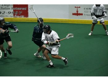 Oswego&#039;s Will Hardy (#22) shoots in recent action vs. the Salt City Eels.