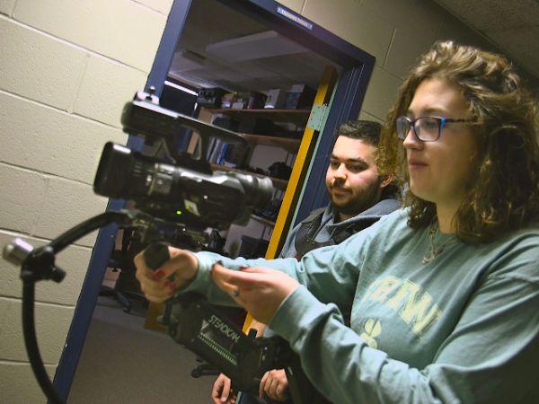 Open for business -- Students Amanda McKnight (right) and Matthew Cancél operate video equipment for Lakeside Media@SUNY Oswego, which has launched as a student-staffed, faculty-mentored video production business.