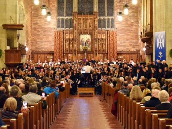 Inspiring surroundings -- The college-community Festival Chorus, directed by Mihoko Tsutsumi of SUNY Oswego&#039;s music faculty, returns to St. Mary of the Assumption Catholic Church, 103 W. Seventh St. in Oswego, for Mozart&#039;s &quot;Requiem,&quot; a free concert starting at 7:30 p.m. Saturday. The chorus&#039; last performance there (above) was for Mendelssohn&#039;s &quot;Magnificat&quot; in December.